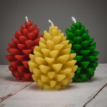 Load image into Gallery viewer, Pine Cone Beeswax Candles - red, yellow and green - sold out!
